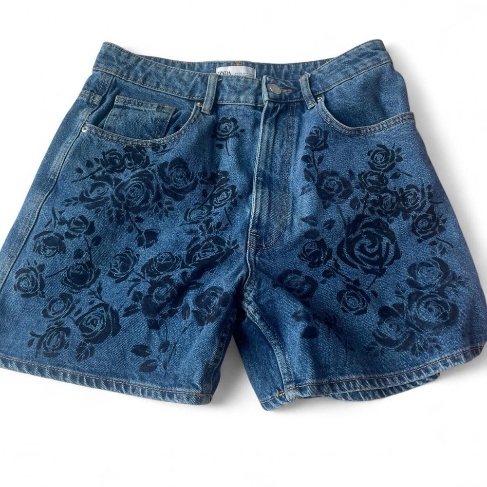 Handpainted black roses on blue denim shorts